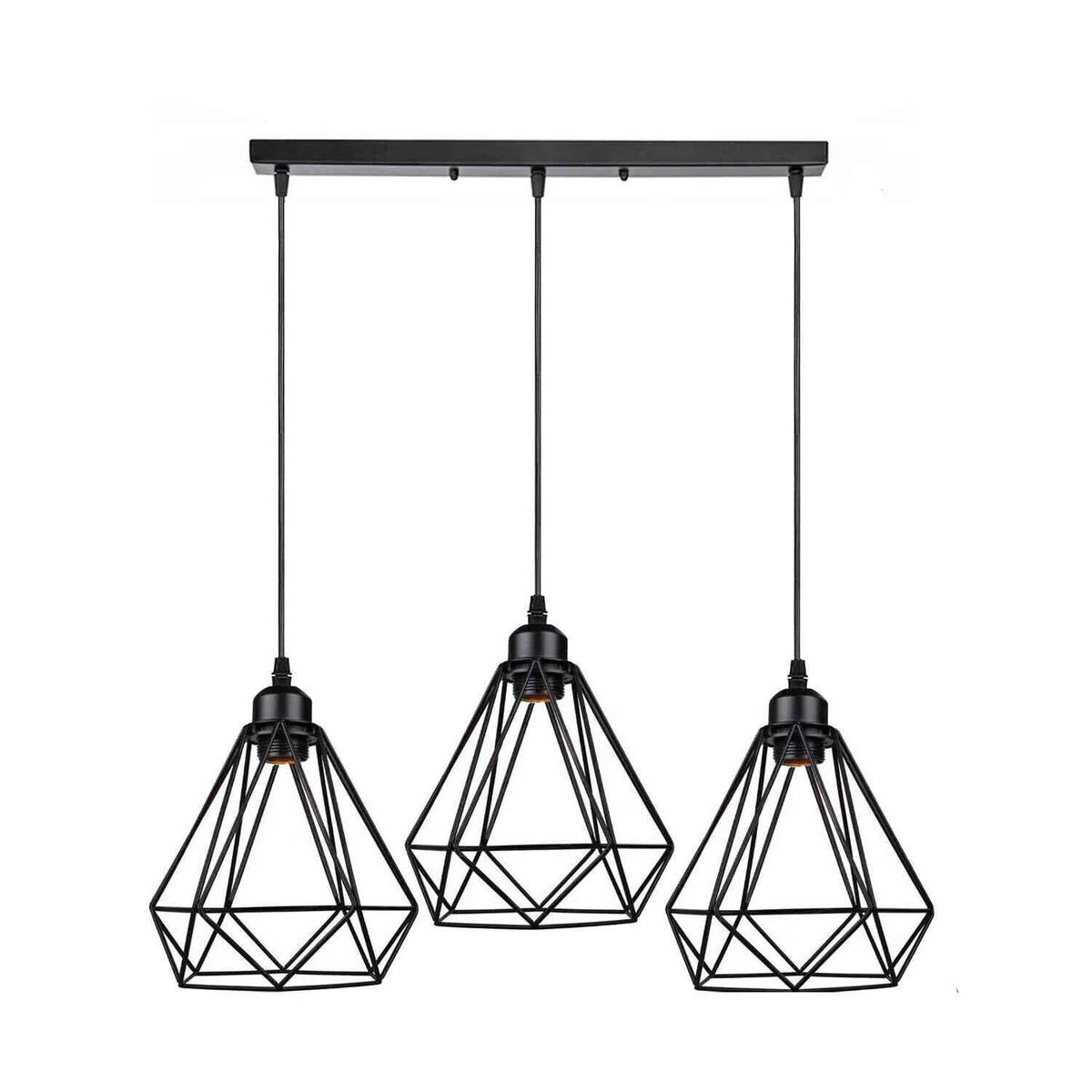 Three black metal cage industrial pendant lights hanging with adjustable cables over a wooden table in a modern room