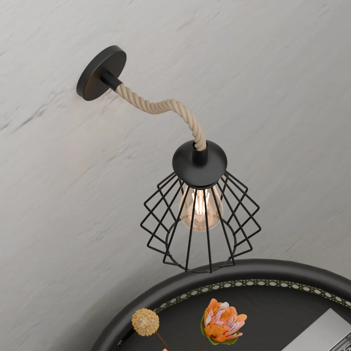 Vintage rope wall light with black metal diamond cage and twisted hemp rope cable, ideal for rustic interior decor