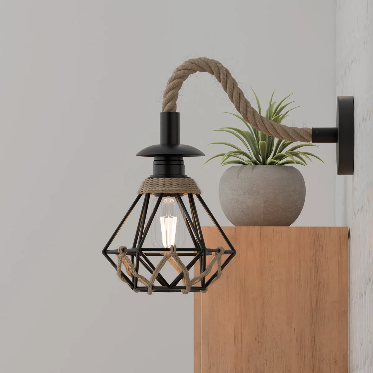 Black vintage rope wall light with twisted hemp rope and metal cage shade, suitable for indoor wall mounting
