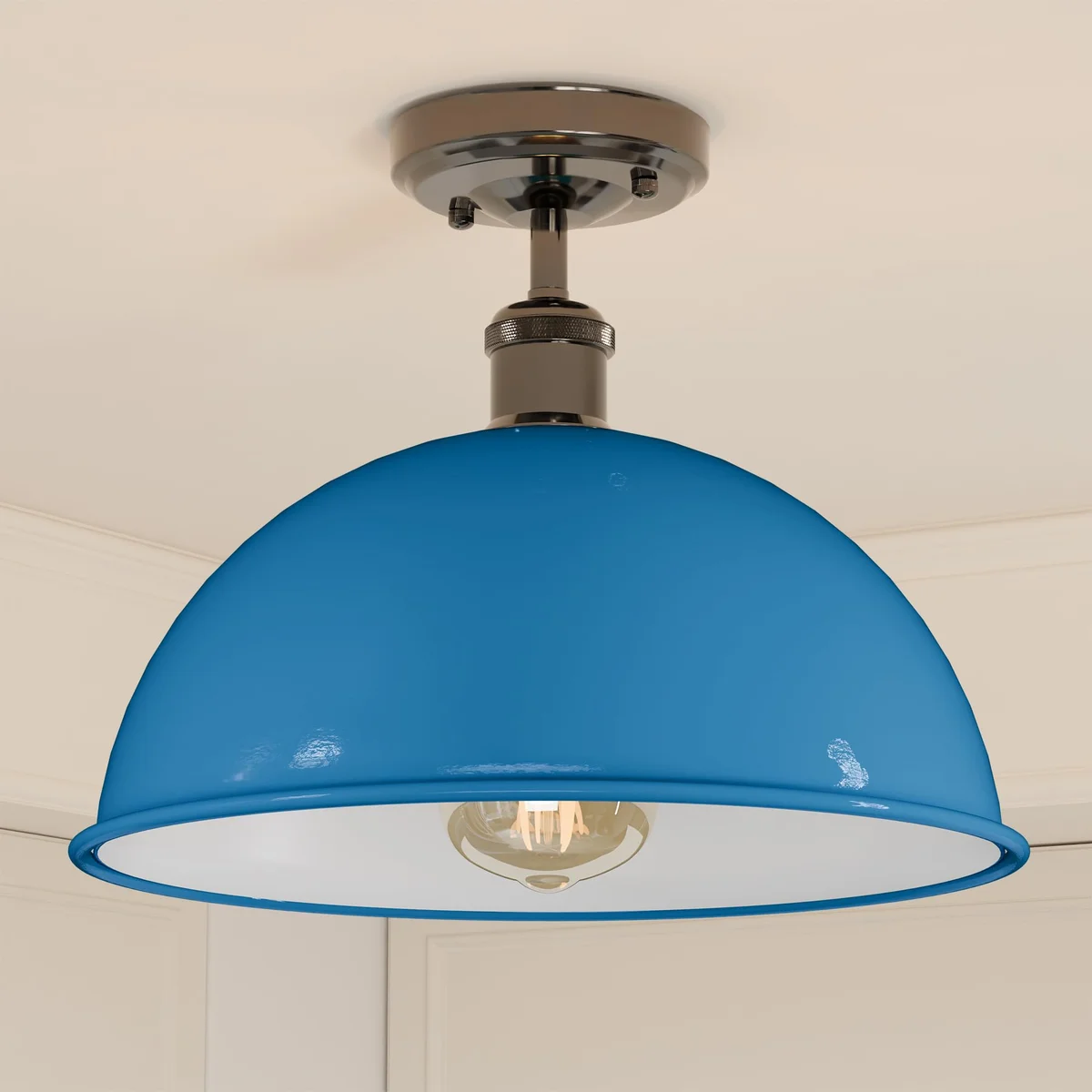 Black metal dome semi flush ceiling light mounted on low ceiling, casting warm ambient glow in modern interior