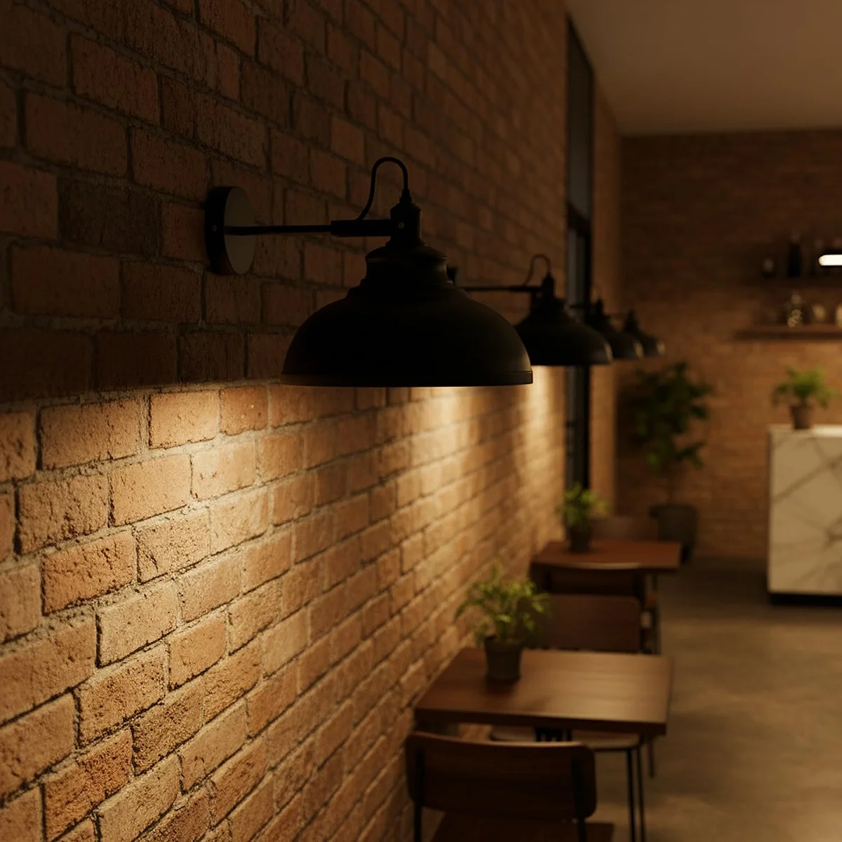 Adjustable industrial wall light with matte black curved metal arm and wide 29 cm dome shade mounted on wall