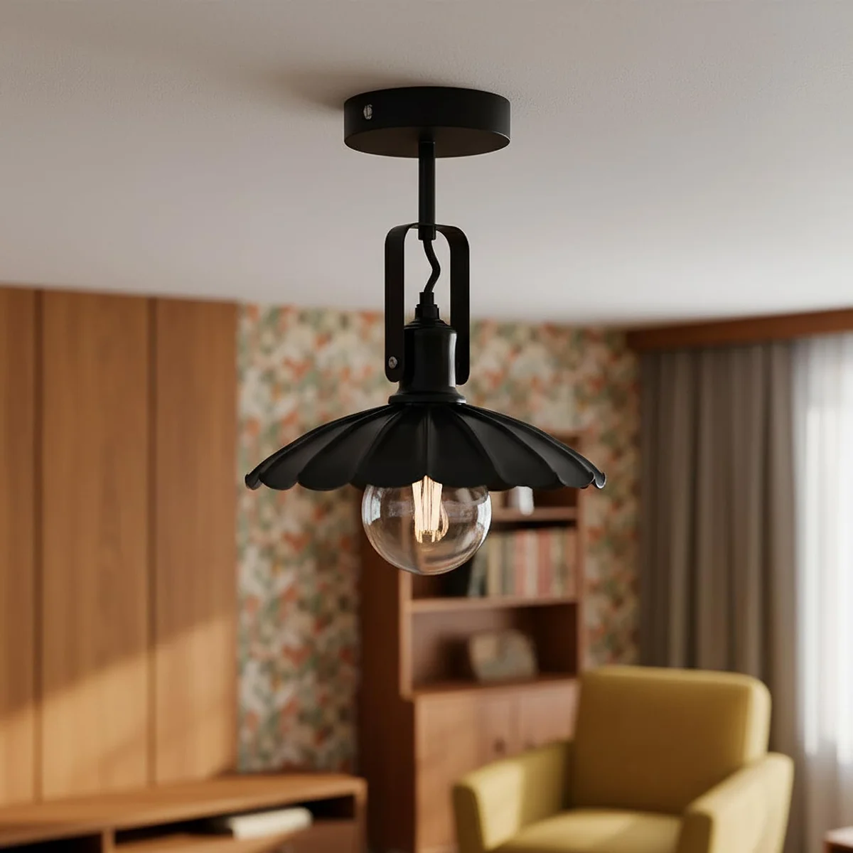 Matte black adjustable industrial ceiling light with curved metal shade and swivel lamphead on semi-flush mount