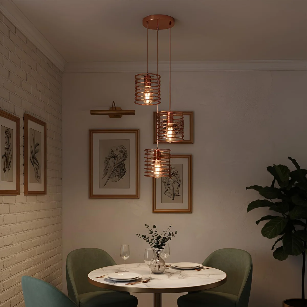Triple head rose gold pendant light with metal cage shades hanging from adjustable cords in a modern kitchen setting