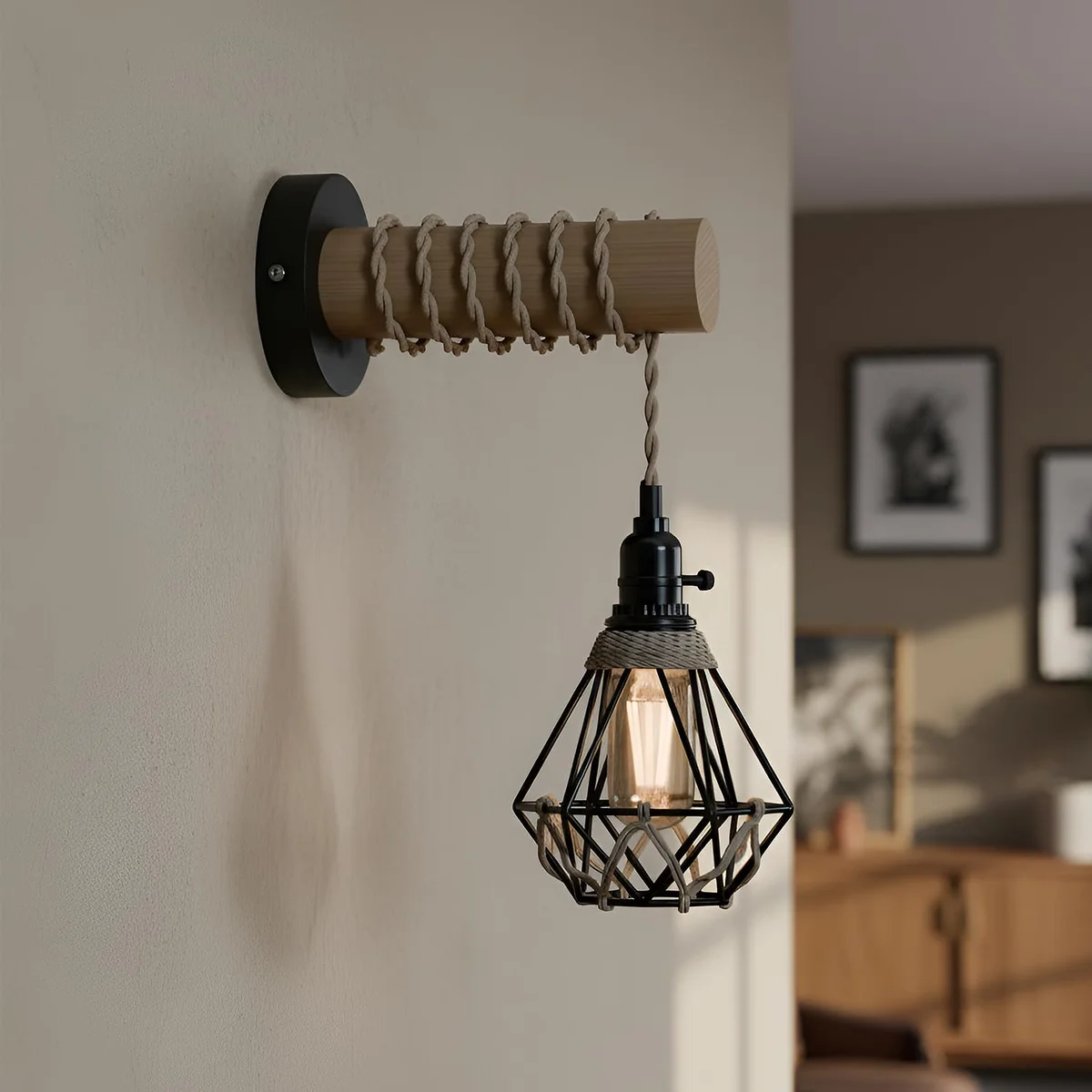 Rustic industrial wall light with natural wood arm, black metal cage, and twisted jute rope cable mounted on wall