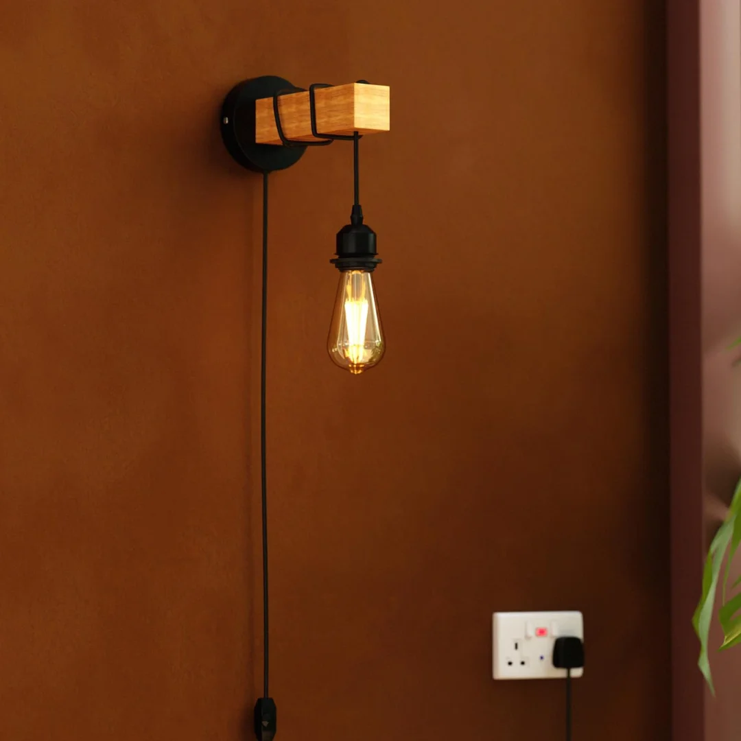 Dimmable wooden wall light with black metal pipe, wooden shelf base, rotary dimmer switch, and plug-in cable design