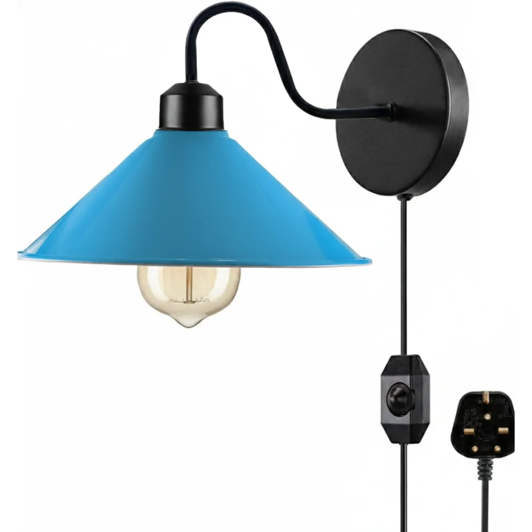 Red industrial metal adjustable wall light with E27 bulb, fabric cord, and built-in dimmer switch plugged into UK socket