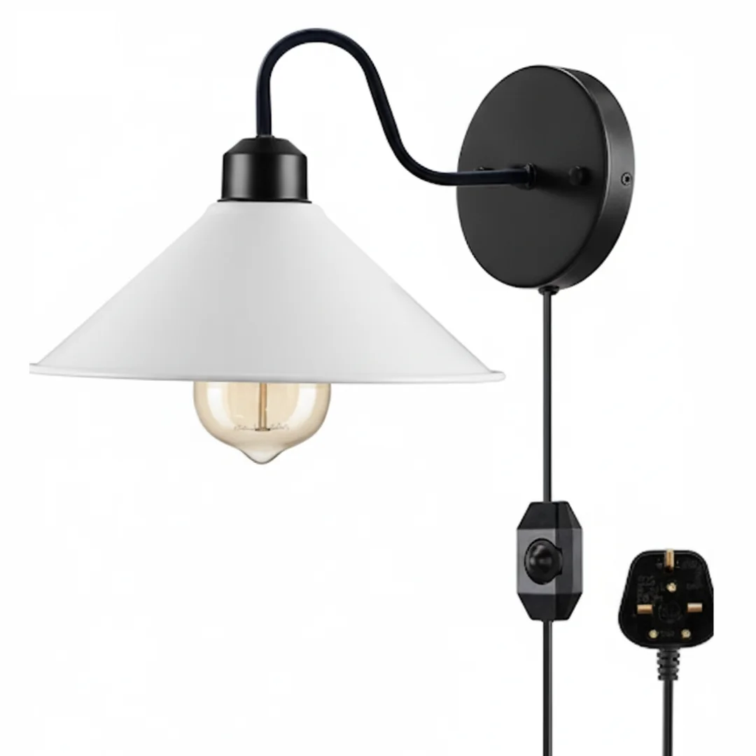 Red metal industrial plug in wall light with dimmer switch on fabric cord against white background