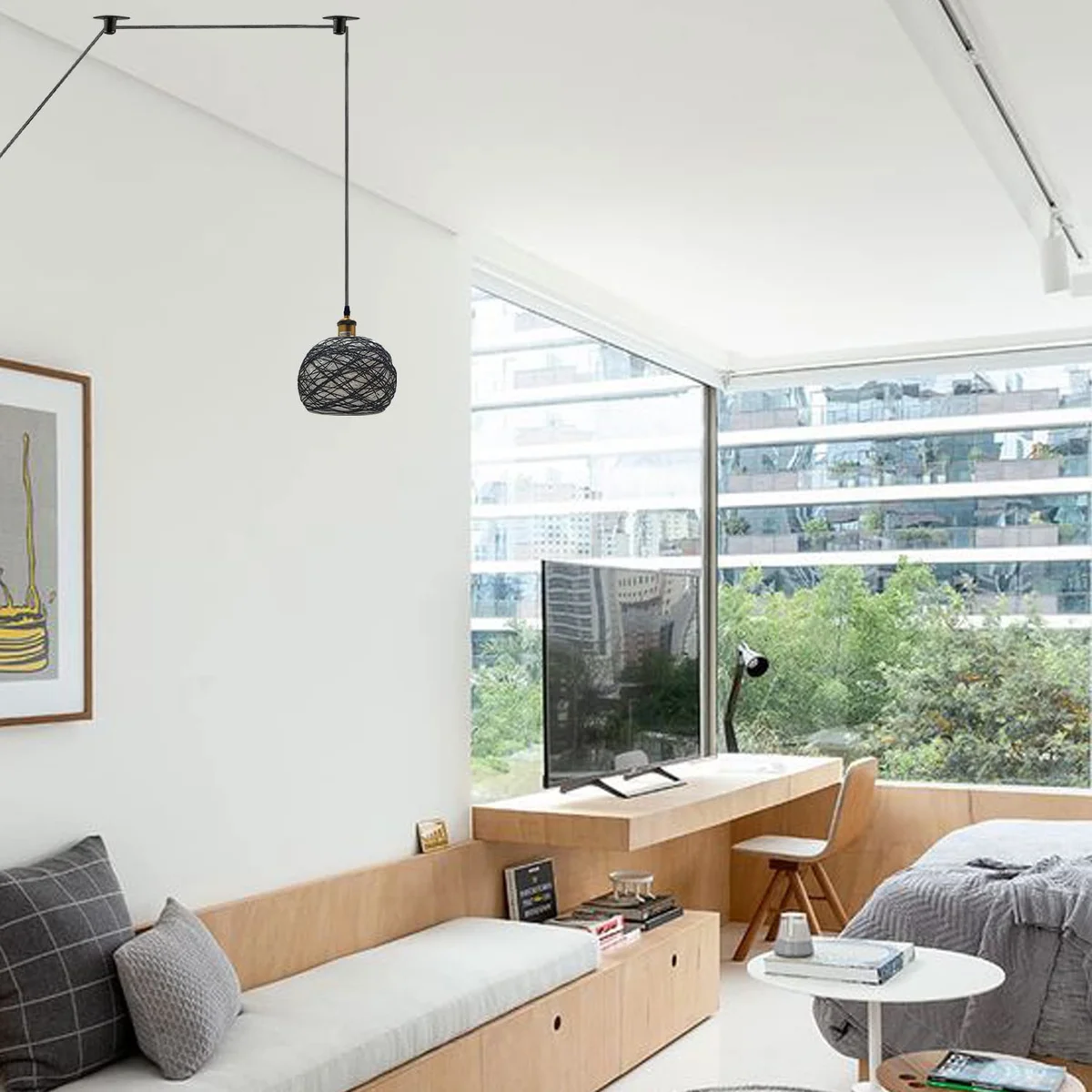 Ambient pendant lamp with rattan and hemp shade hanging from ceiling, featuring metal accents and long cable