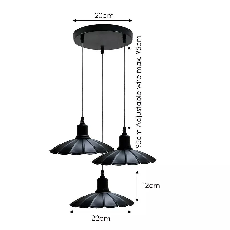 Black metal 3-head pendant light with industrial style lighting and 95cm PVC cable hanging against white background