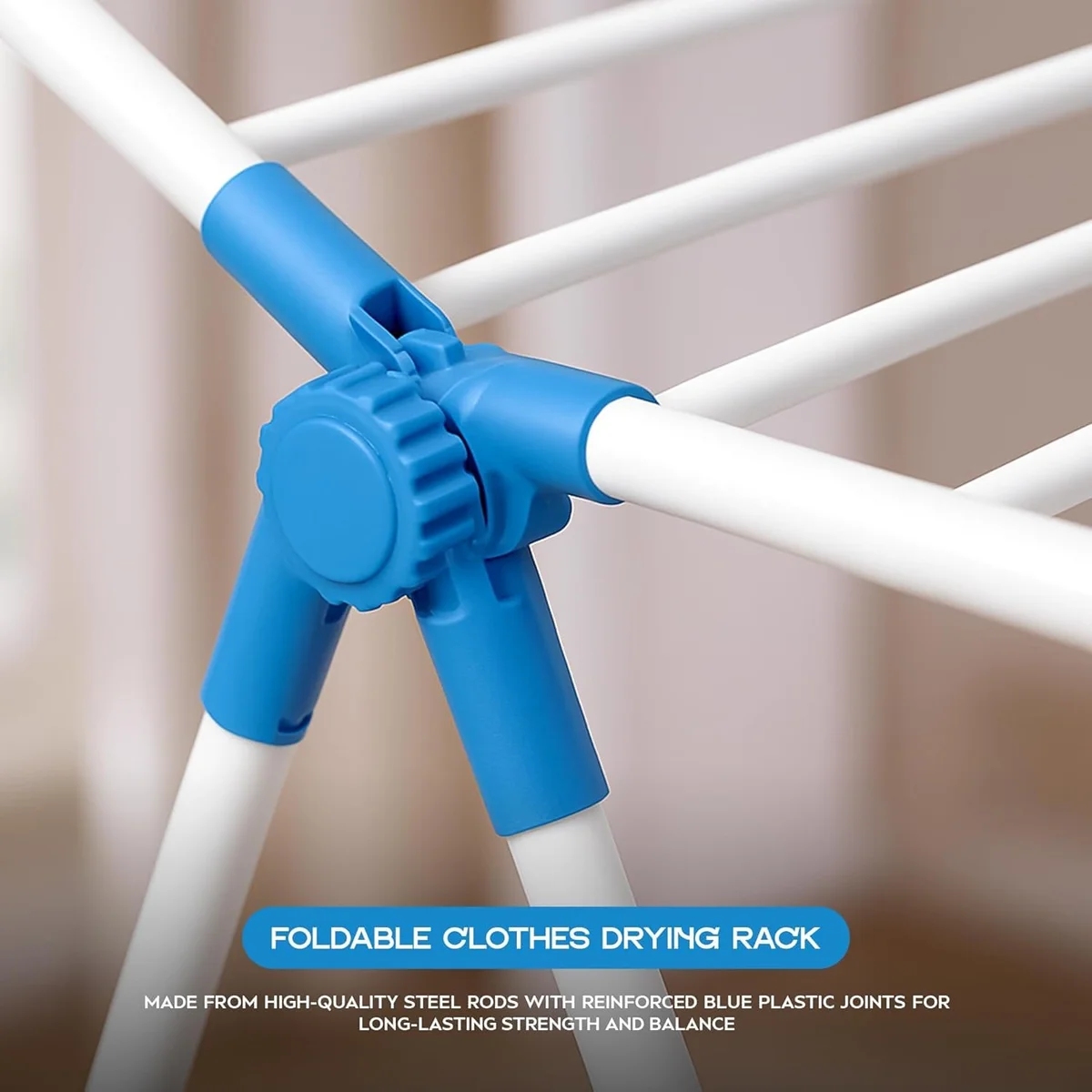 Foldable clothes drying rack in white and pink stainless steel, three-tier design with multiple bars for drying clothes indoors or outdoors