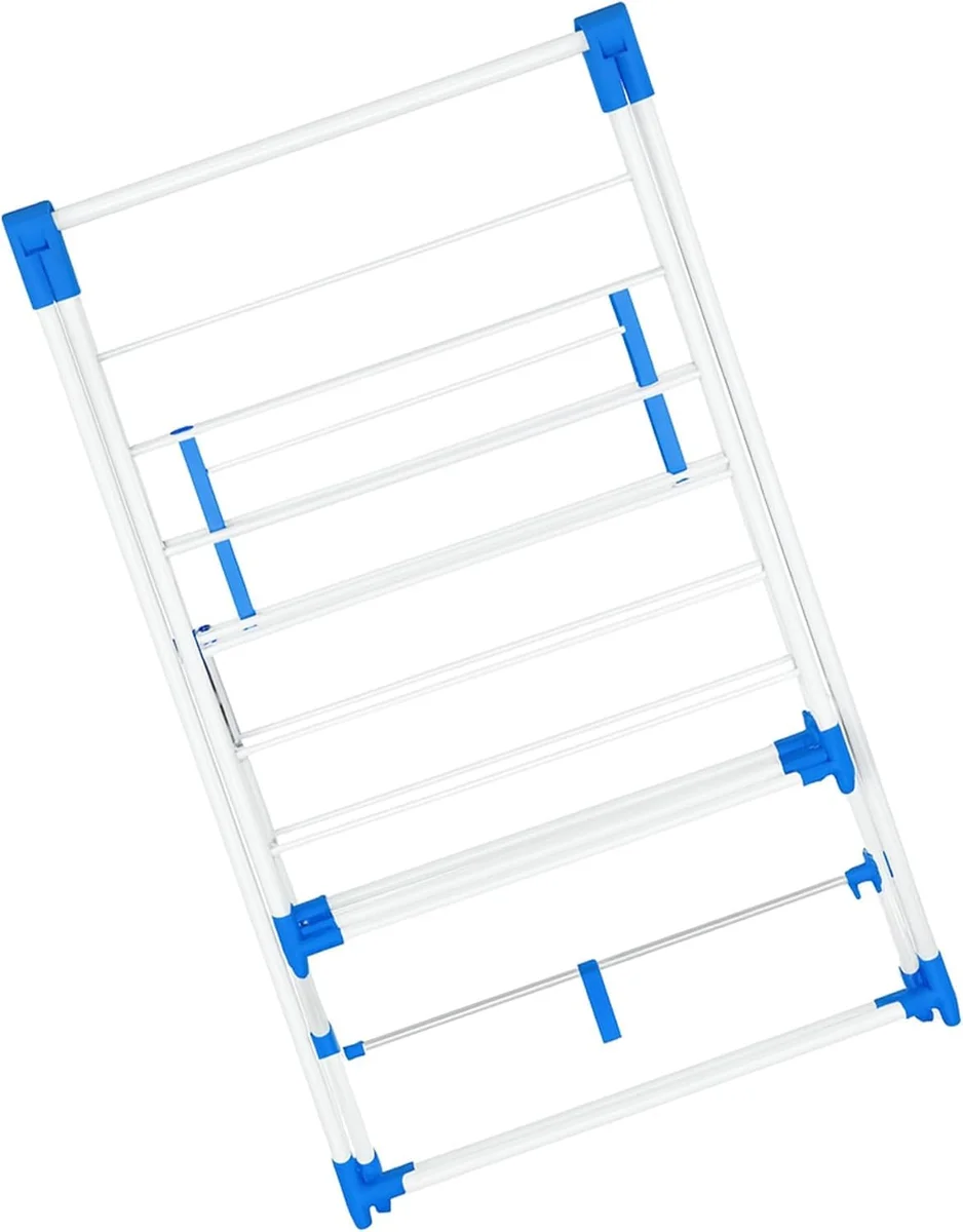 Foldable clothes drying rack in white and pink stainless steel with three tiers and non-slip feet on wooden floor