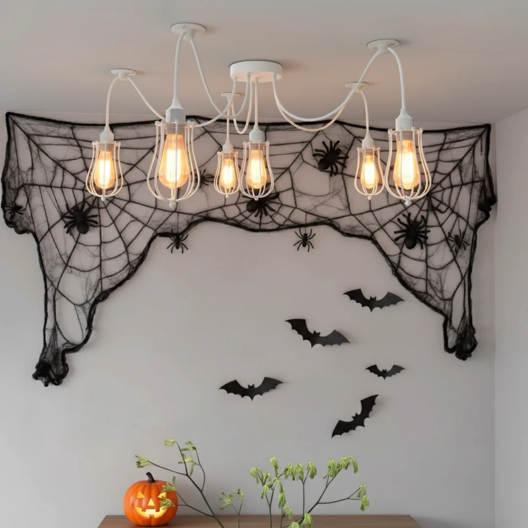 White industrial spider pendant light with six adjustable metal cage shades hanging from fabric cables