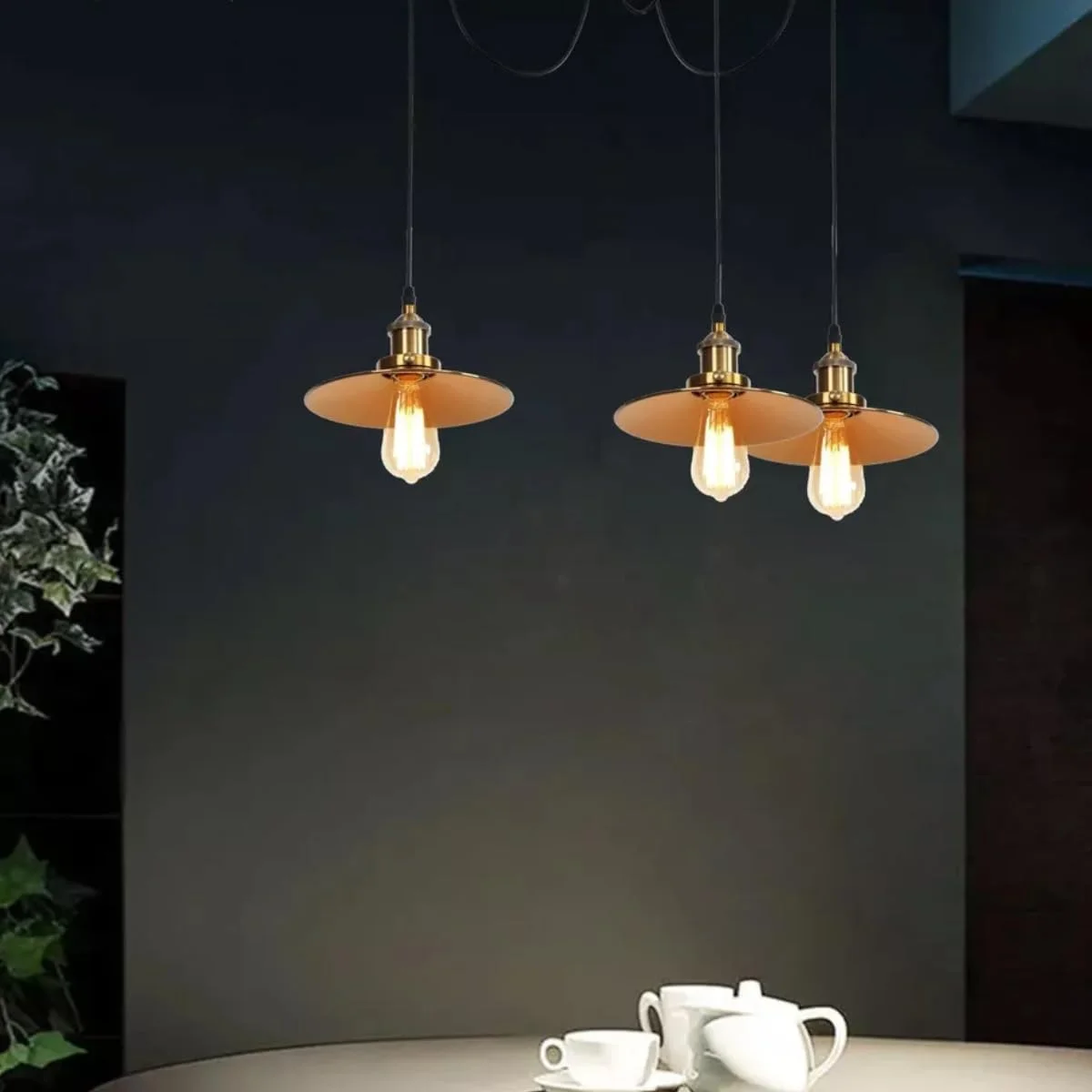 Vintage metal ceiling light with adjustable length, Edison-style filament bulb, industrial rustic design in warm white glow