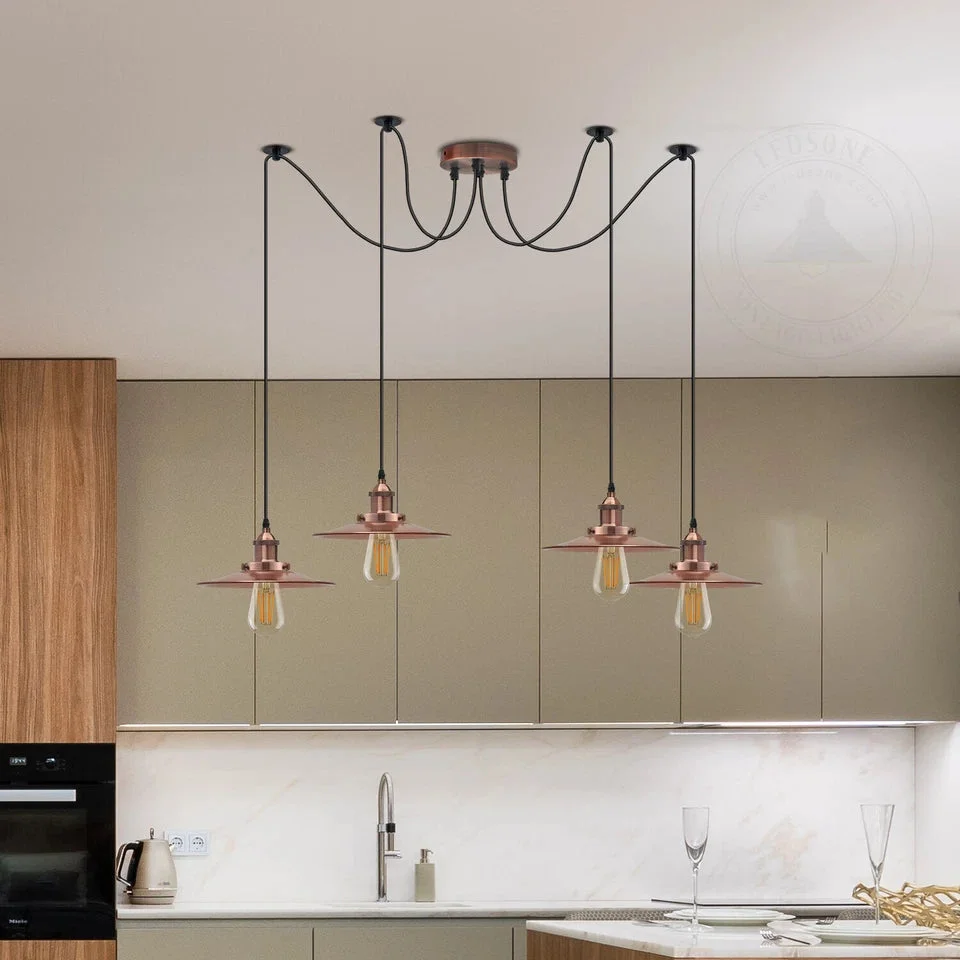 Vintage industrial indoor hanging light with four metal shades and adjustable cables on a ceiling mount