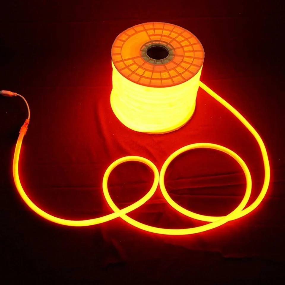 Three flexible orange-red neon LED strip lights coiled, showing waterproof silicone design for indoor or outdoor use