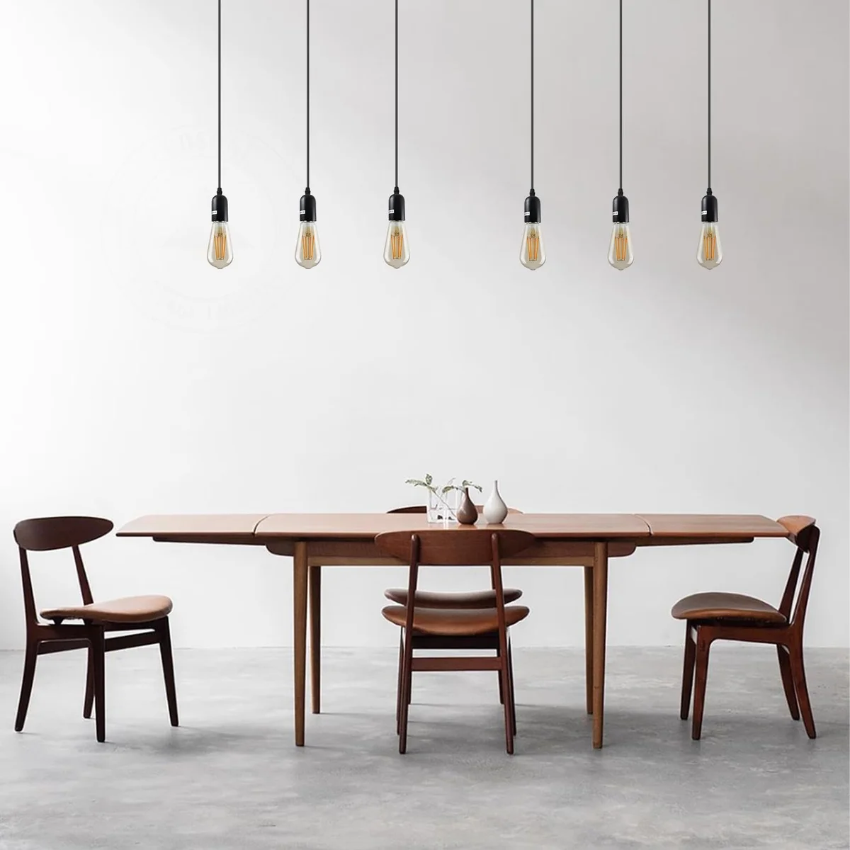 Three antique brass light pendant holders attached to a rectangular metal ceiling rose with 1m cables hanging down