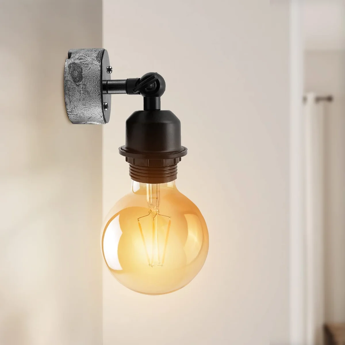 Industrial vintage steampunk style light wall-mounted with galvanized metal finish and round head, suitable for indoor use