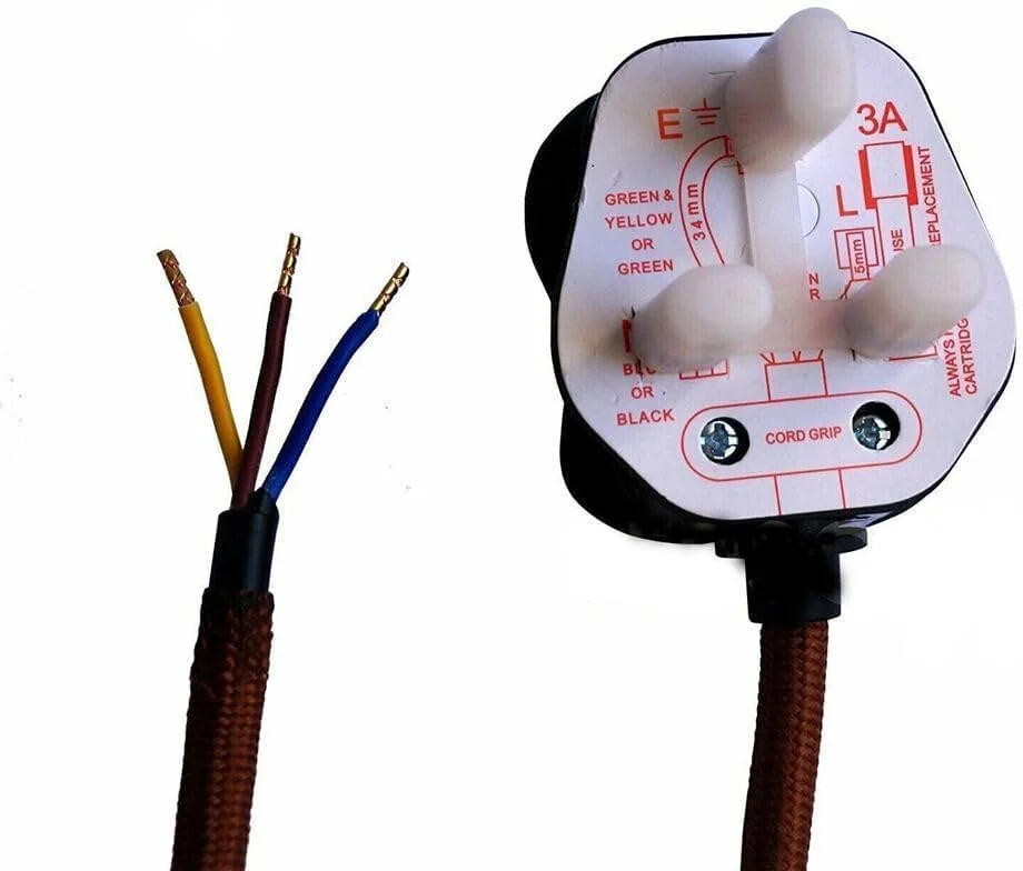 Industrial LED pendant light with braided cable, metal E27 holder, UK 3-pin plug, and inline switch on white background