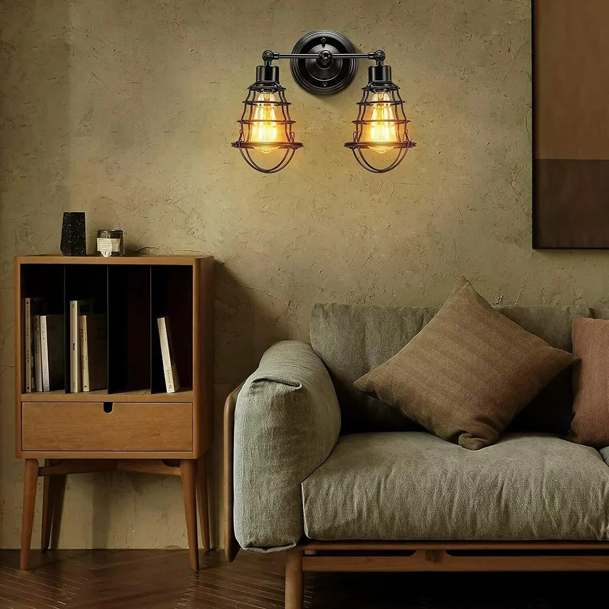 Industrial double cage E27 wall lamp with dual heads, black metal steampunk design and circular decorative backplate