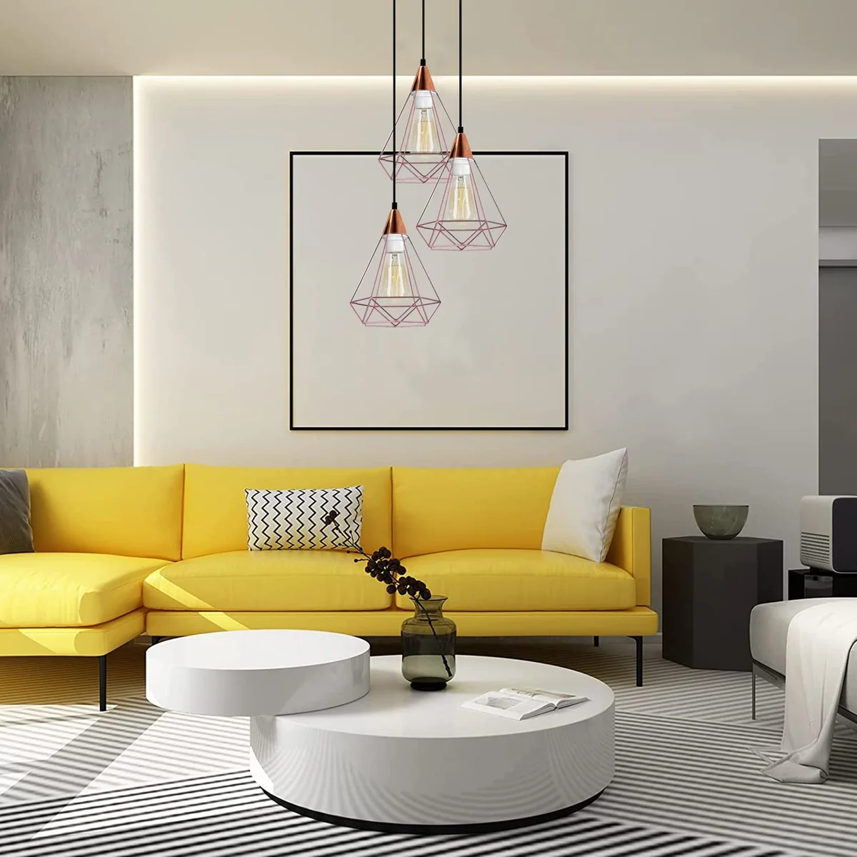 Three-head industrial metal pendant lamp with electroplated finish and adjustable hanging cords against white background