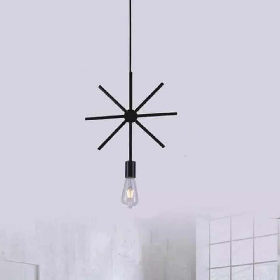 Black metal pendant light with iron frame hanging from ceiling, showcasing industrial vintage design in a dining room setting