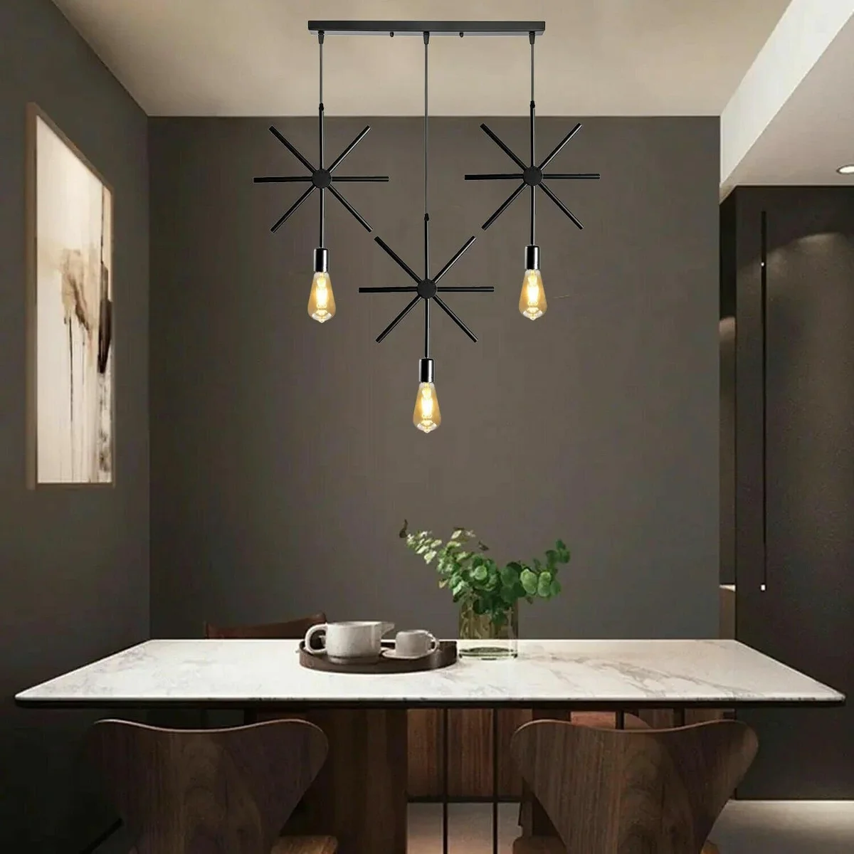 Black industrial metal adjustable pendant lighting with a rectangular frame, hanging from ceiling over a kitchen island