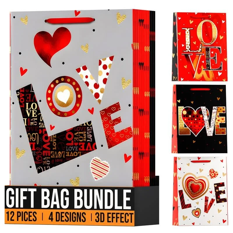 Assorted matte finish gift bags with handles in medium, small, and large sizes, perfect for various gift occasions