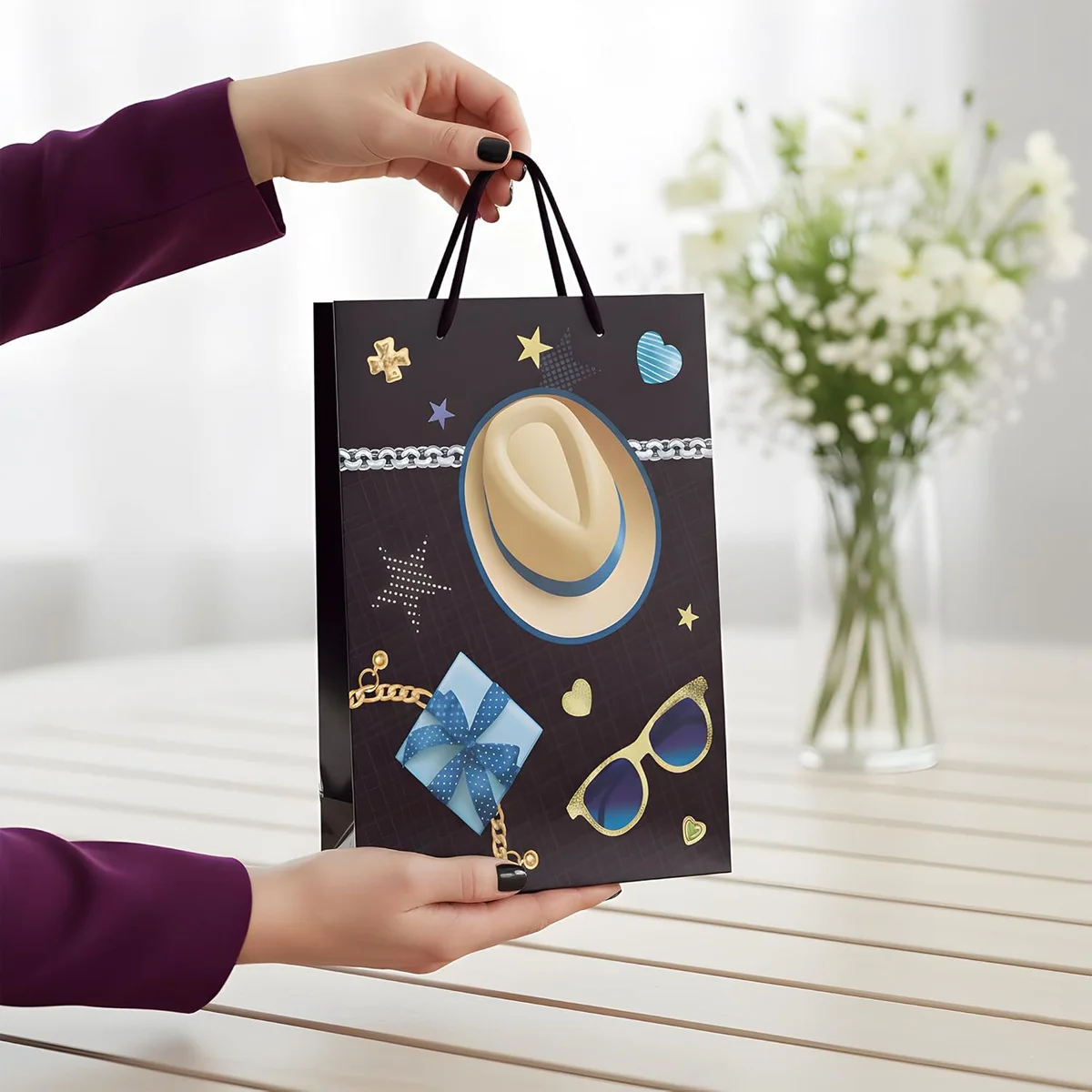 Twelve assorted size luxury gift bags with matte finish and reinforced handles in various colours arranged together