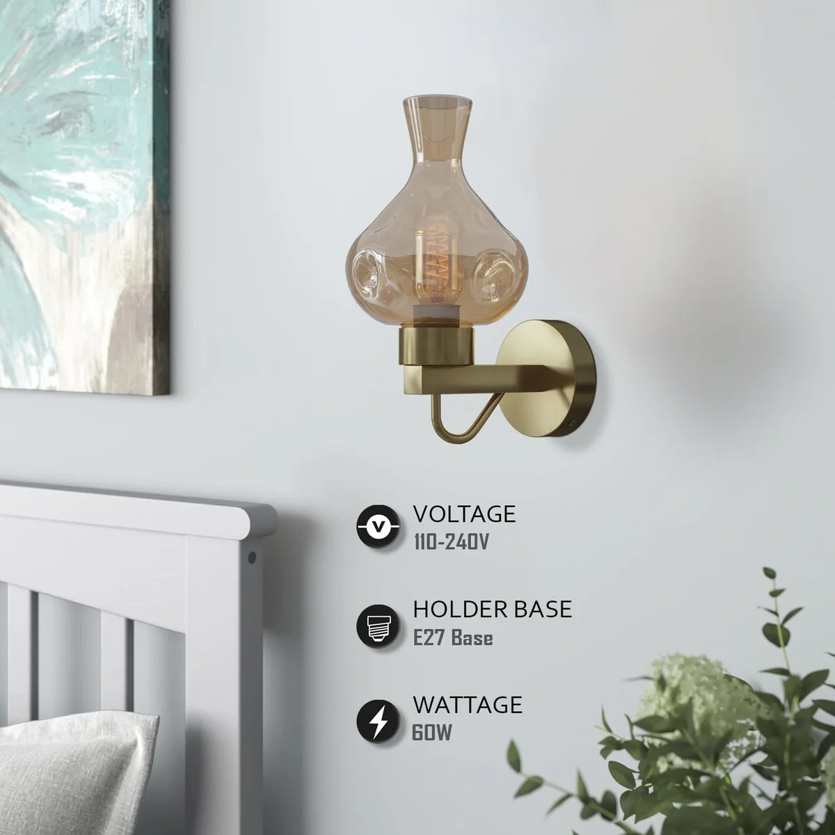 Mid-century wall sconce with antique brass finish and amber glass shade, mounted on wall in living room setting.