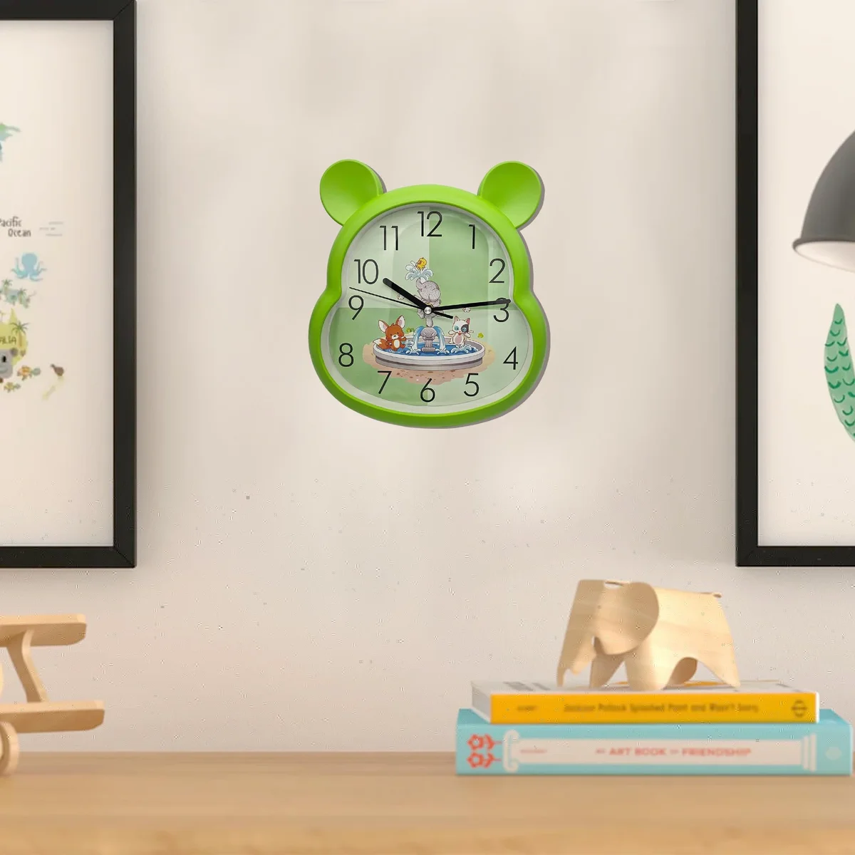 Modern battery powered kids wall clock with plastic frame, 31cm high and 29cm wide, suitable for indoor use
