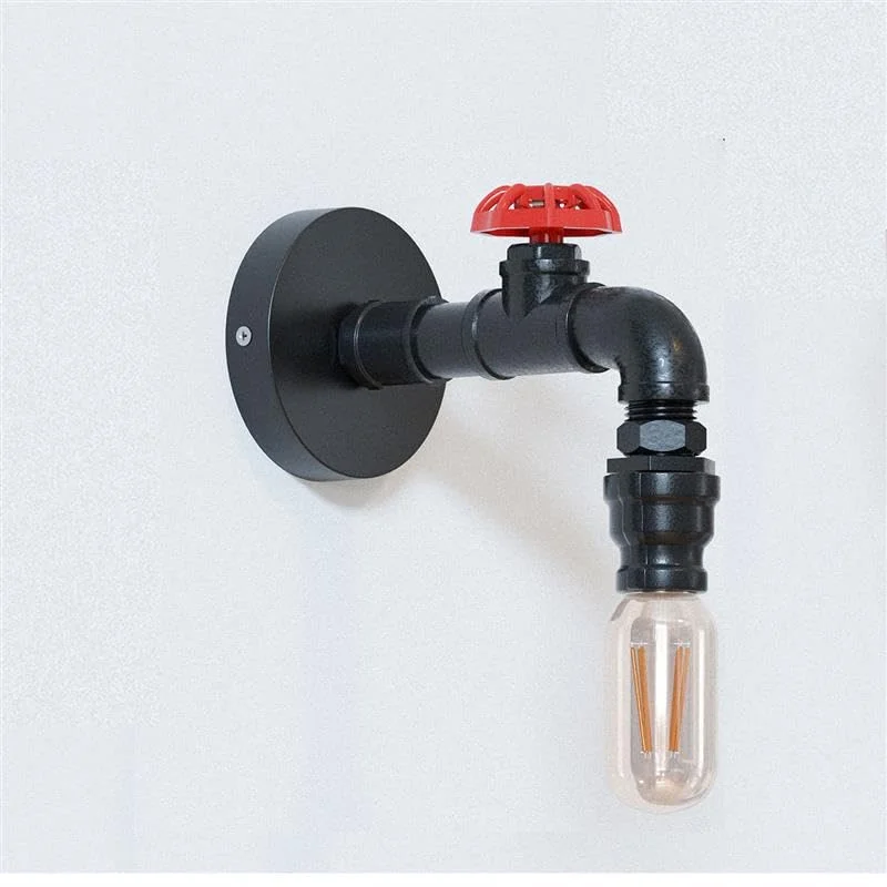 Black steampunk light wall sconce with vintage pipe design and exposed bulb, mounted on a rustic metal back box.