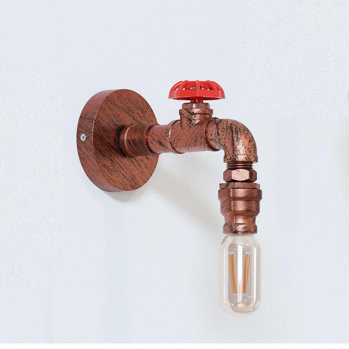 Black metal steampunk wall light with vintage pipe design and E27 bulb mounted on a rustic red back box