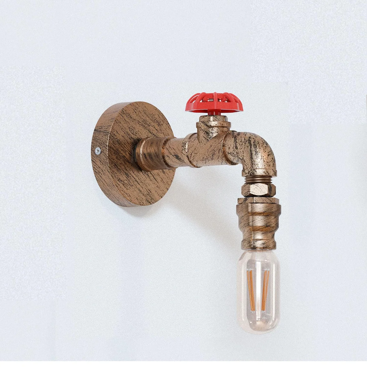 Black industrial steampunk wall light with vintage pipe design mounted on a wall, featuring E27 bulb fitting and metal back box