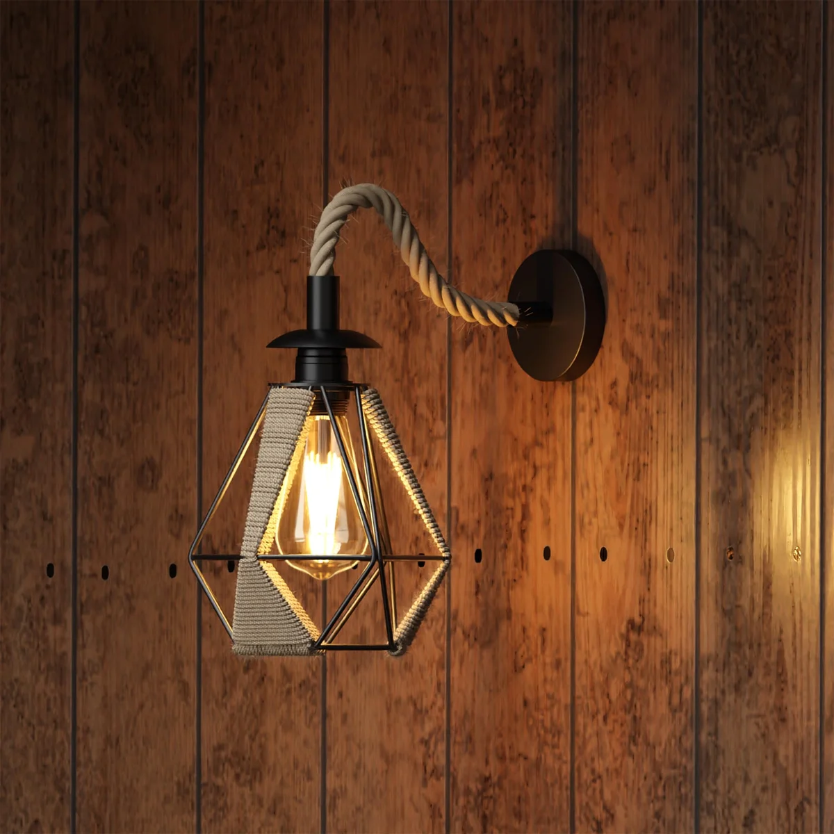 Retro metal shade sconce with natural hemp rope and diamond-shaped black metal shade mounted on wall indoors