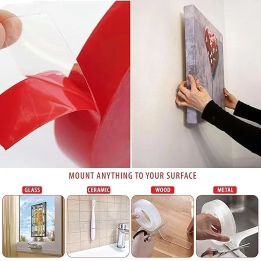 Roll of clear double-sided heavy duty uv resistant tape with red protective film on white background