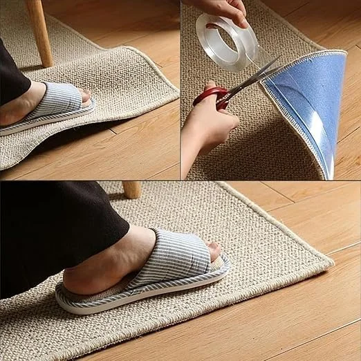 Roll of clear double sided nano tape with red protective film on a white background, showing tape thickness and texture