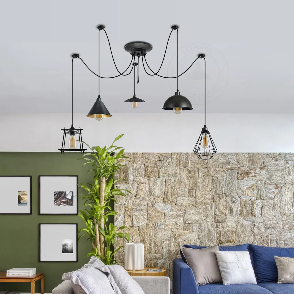 Adjustable pendant light with five vintage metal cage shades hanging from ceiling rose, industrial style, black finish