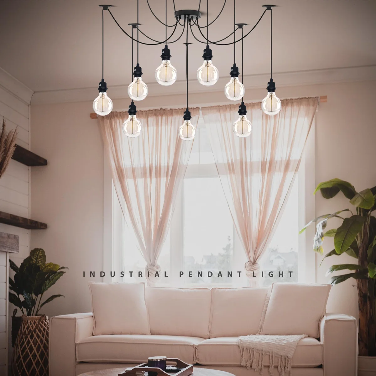 Black industrial spider pendant light with multiple adjustable fabric-covered cables and metal ceiling rose