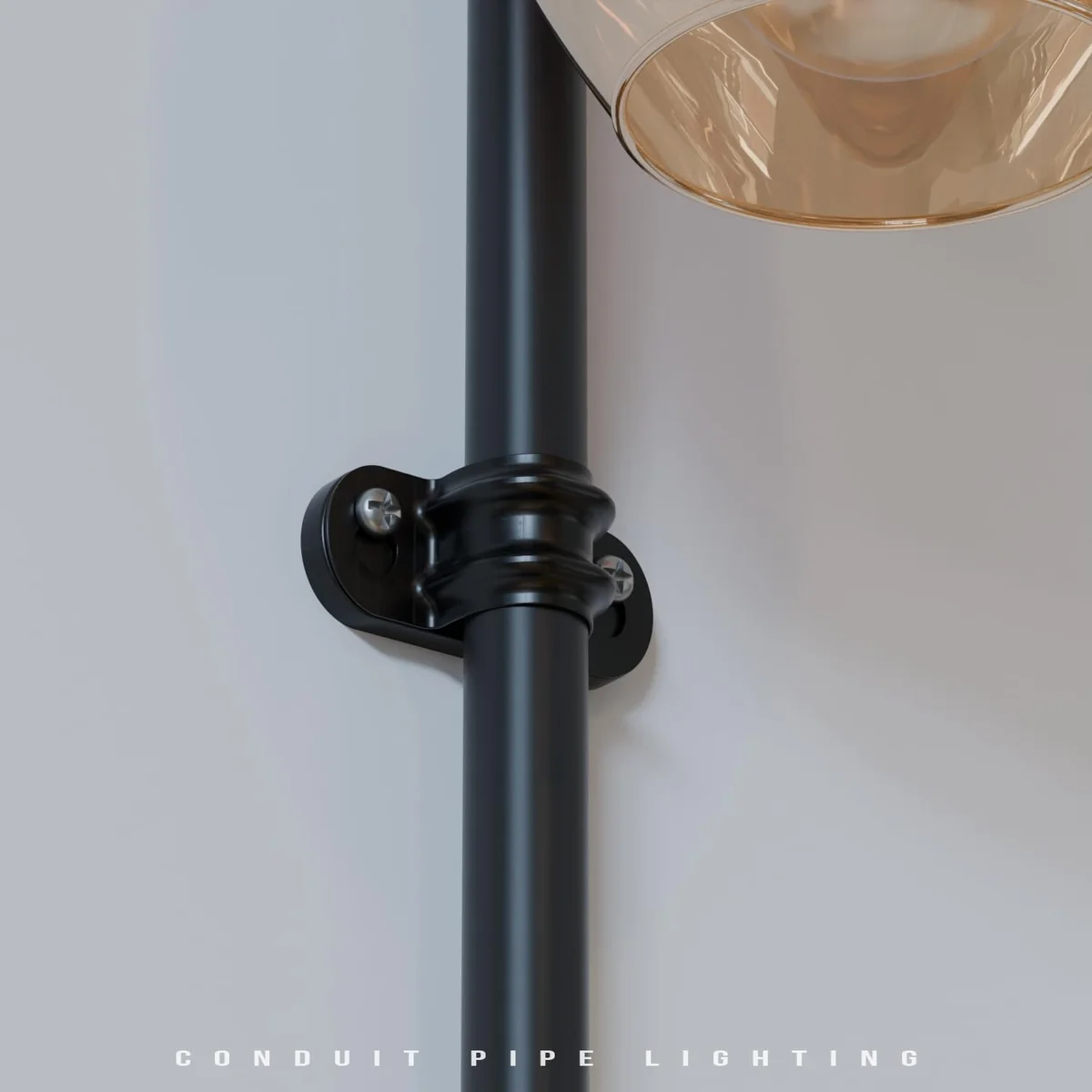 Metal distance saddle clip for 20mm conduit, rectangular rung with screw holes, installed on a wall.