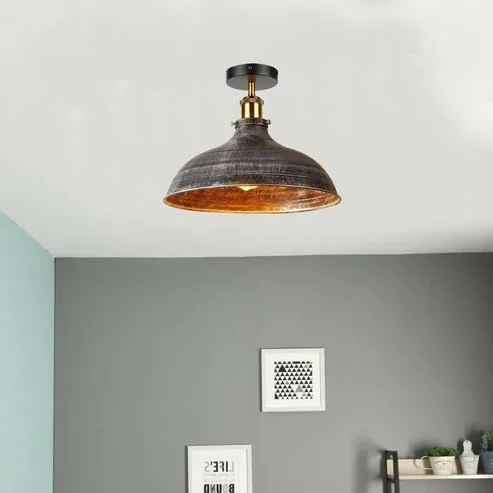 Industrial flush mount ceiling light with distressed black metal and brass details, 36cm wide, warm white LED bulb included