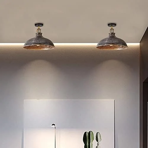 Industrial metal ceiling light with distressed black finish and brass details, flush mount design, 36cm wide, warm white LED bulb included