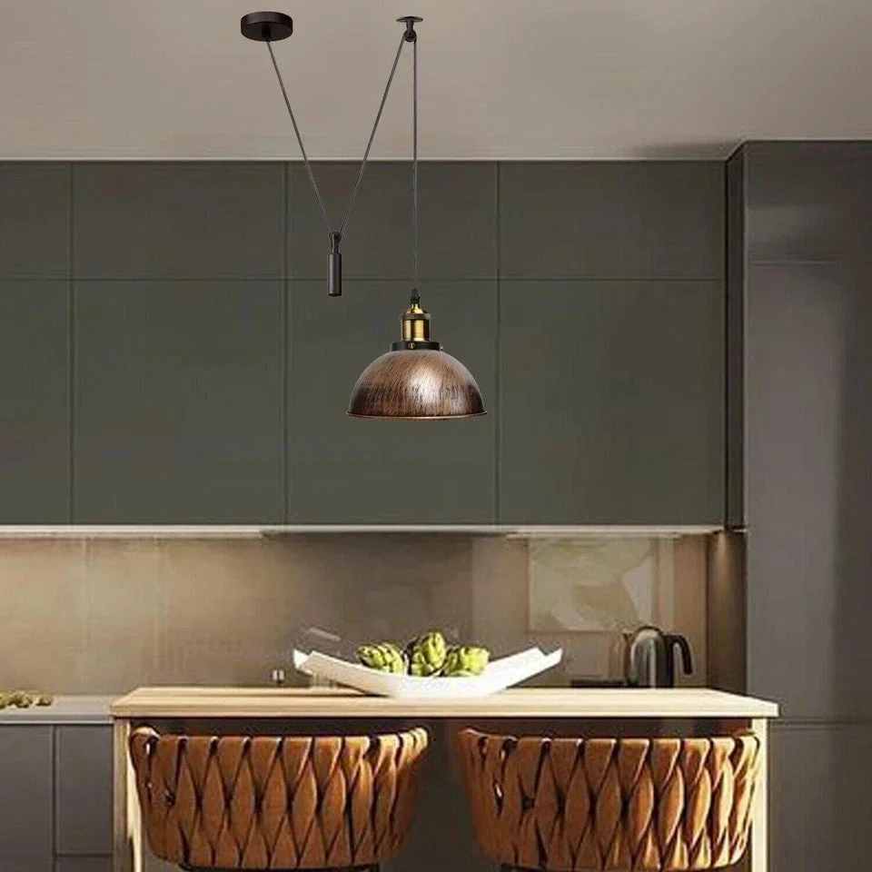 Black metal pulley pendant light with lampshade hanging, emitting soft ambient light, E27 bulb holder and 200cm cable