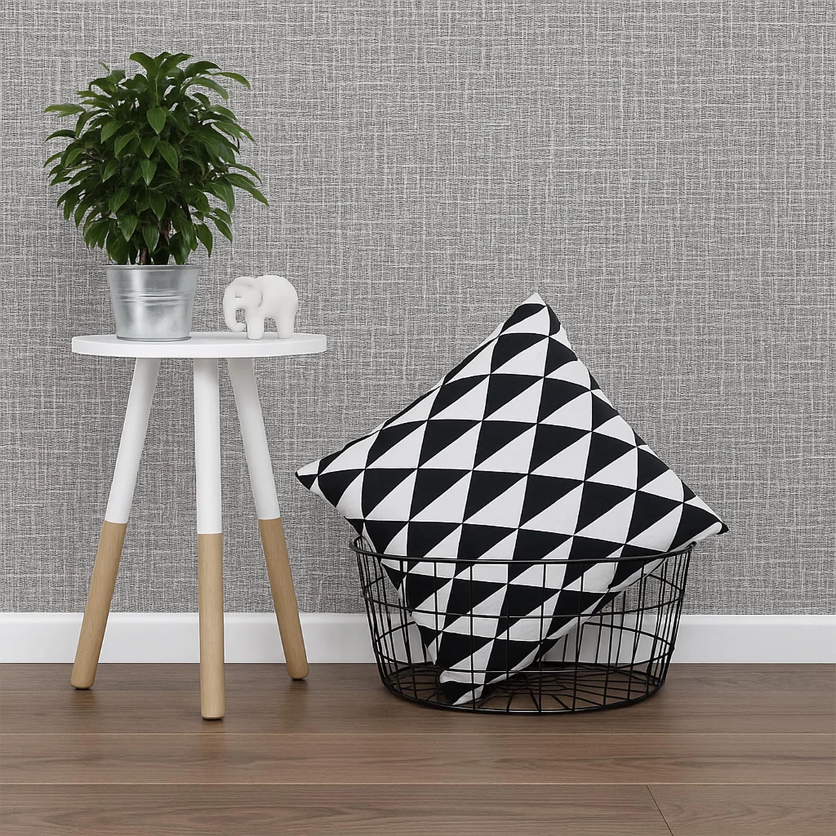 Roll of grey peel and stick wallpaper with a light grey linen texture on a white background