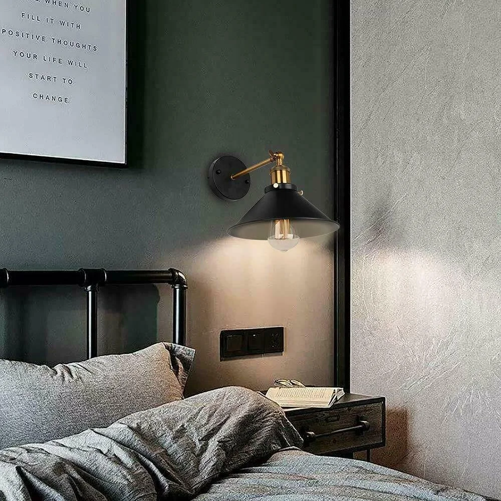 Pair of black modern wall sconce LED light fixtures with sleek metal design, ideal for living rooms or hallways