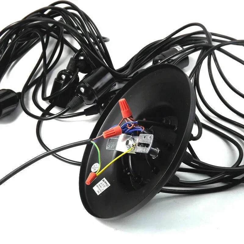 Black industrial spider chandelier with 8 adjustable arms and E27 bulbs, vintage style, hanging indoors against white background