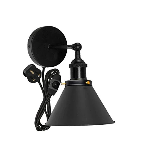 Matte black industrial wall lamp with adjustable swivel arm, cone-shaped shade, and in-line dimmer switch plugged in on wall