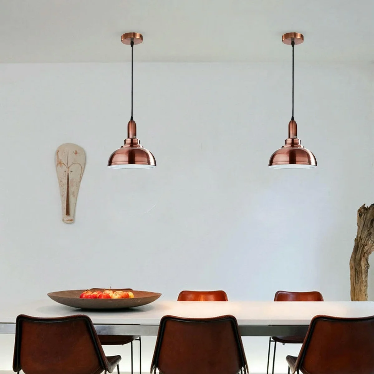 Copper coloured industrial pendant light with adjustable cable and metal E27 lamp holder hanging from ceiling rose