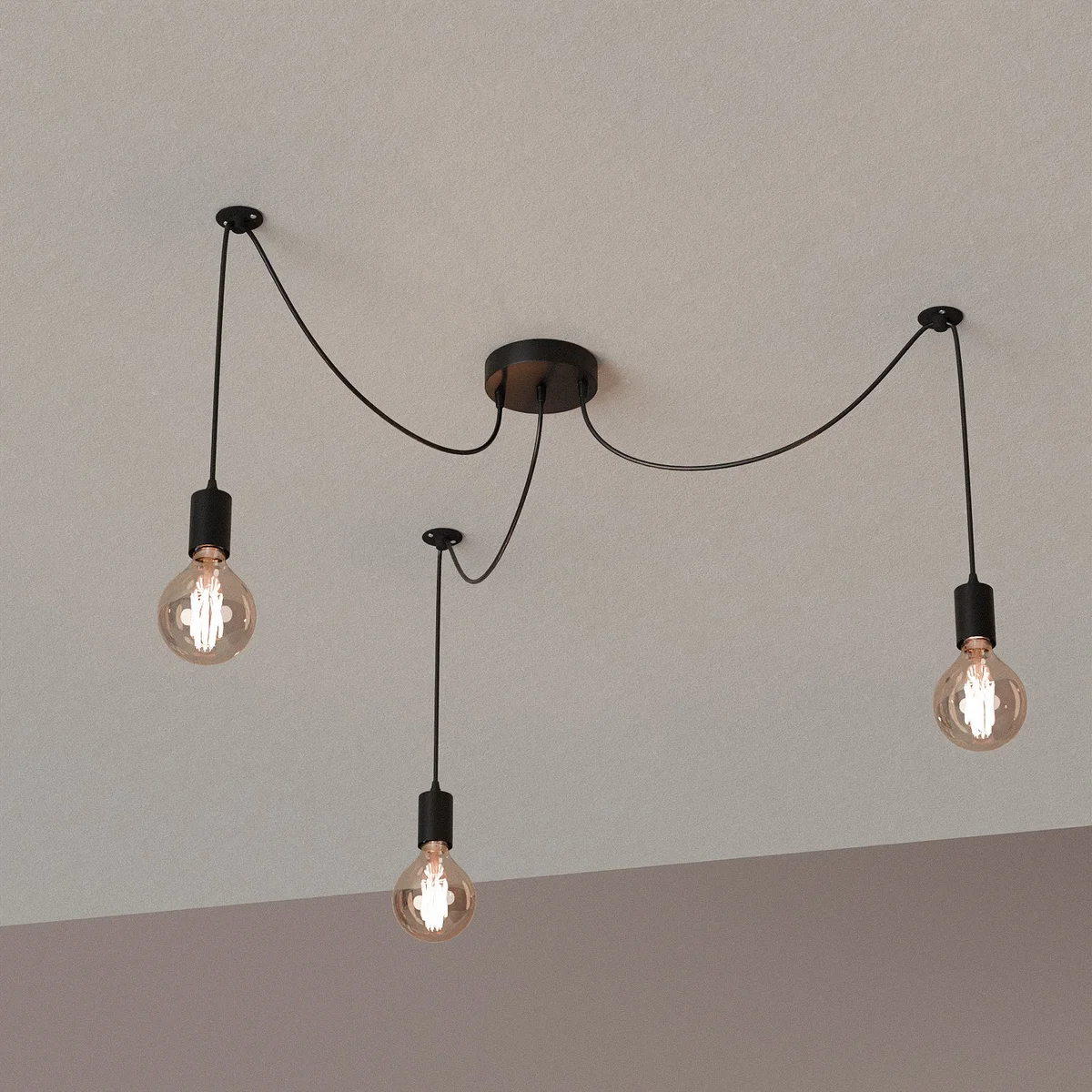 Three‑armed metal spider pendant with black PVC cable, adjustable length, ideal for an adjustable ceiling light in interiors