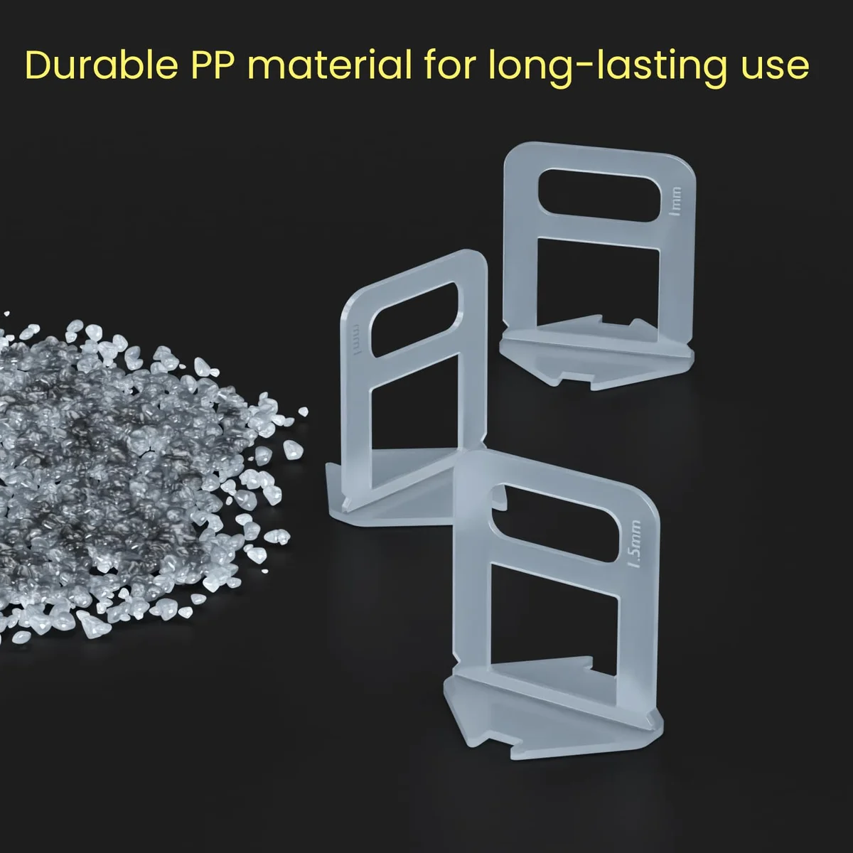 White X-shaped eco-friendly tile spacers clips arranged on a plain background for tile gap spacing and leveling