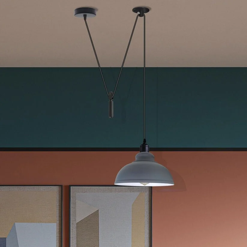 Curvy 1-way spider pendant light in brushed silver metal with adjustable cord and E26 bulb pendant socket hanging indoors